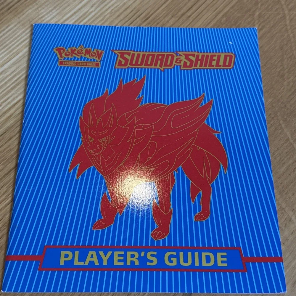 Lot Of 4 Pokémon Sword & Shield Players Guide 2 Red 2 Blue